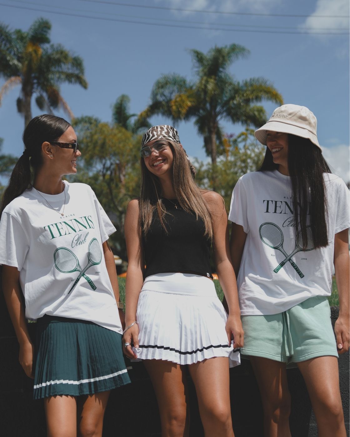 Blaire models with front view of sage green comfy track shorts - showing relaxed fit and soft fabric